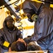 Marine CBIRF members conducts decontamination rinsing during Exercise Vista Forge