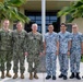 U.S. and Republic of Singapore Navy (RSN) pose for a photo at Commander, Submarine Squadron 15, during the 4th RSN and U.S. Navy Submarine Force Staff Talks
