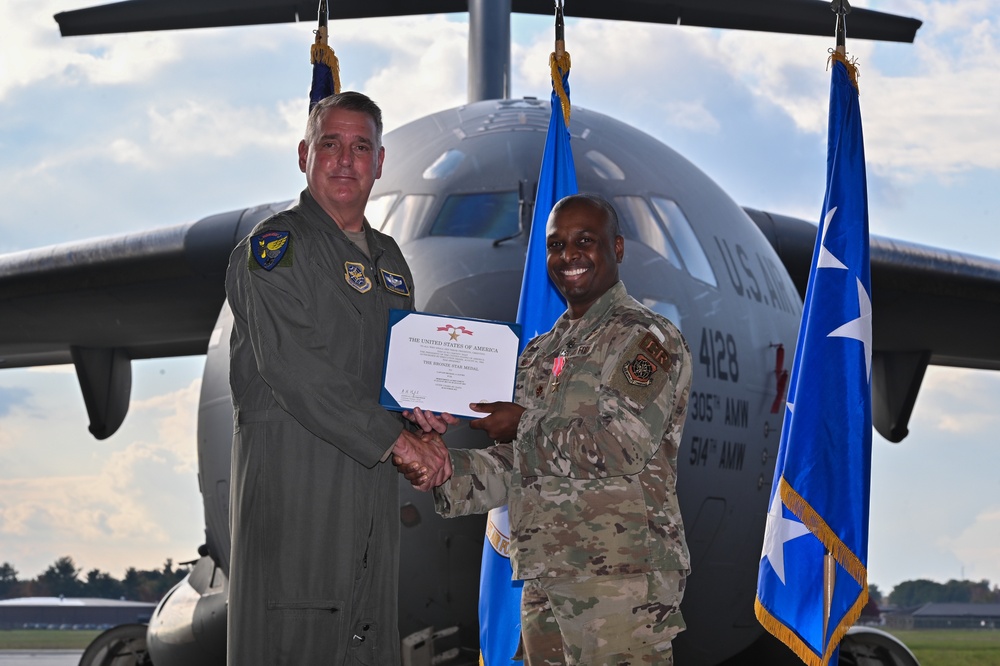 621st Contingency Response Wing Airmen are awarded at distinguished flying cross and bronze star medal ceremony