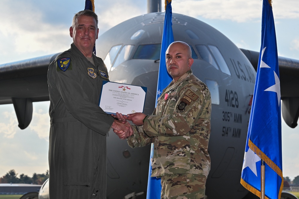 621st Contingency Response Wing Airmen are awarded at distinguished flying cross and bronze star medal ceremony