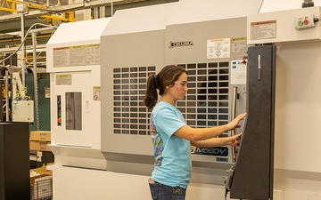 Anniston Army Depot Pathways trainee operates vertical milling center