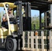 Forklift Operator Preparing Ammo for Distribution