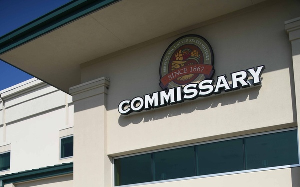 Industry sales promotion nets track chair for Navy disabled veteran at Jacksonville Commissary