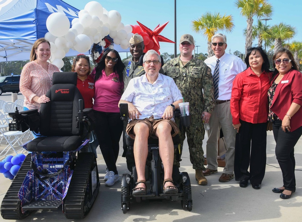 Industry sales promotion nets track chair for Navy disabled veteran at Jacksonville Commissary