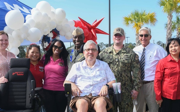 Industry sales promotion nets track chair for Navy disabled veteran at Jacksonville Commissary