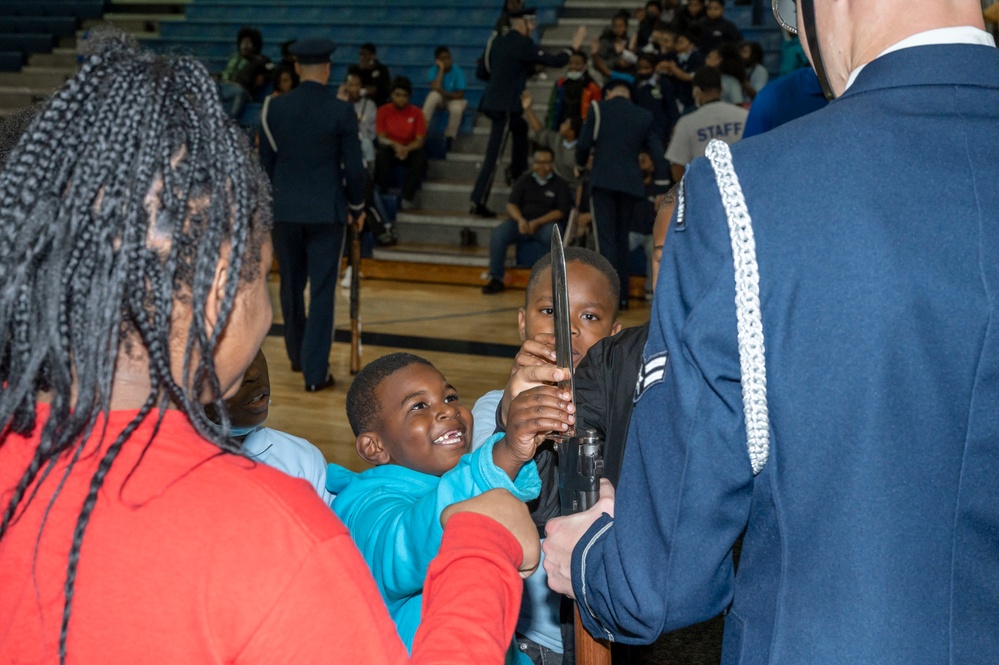 US Air Force Honor Guard Drill Team performs for local children