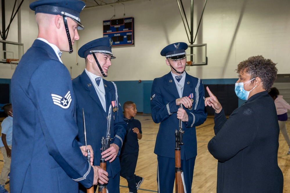 US Air Force Honor Guard Drill Team performs for local children