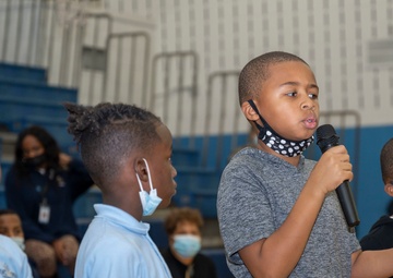 US Air Force Honor Guard Drill Team performs for local children