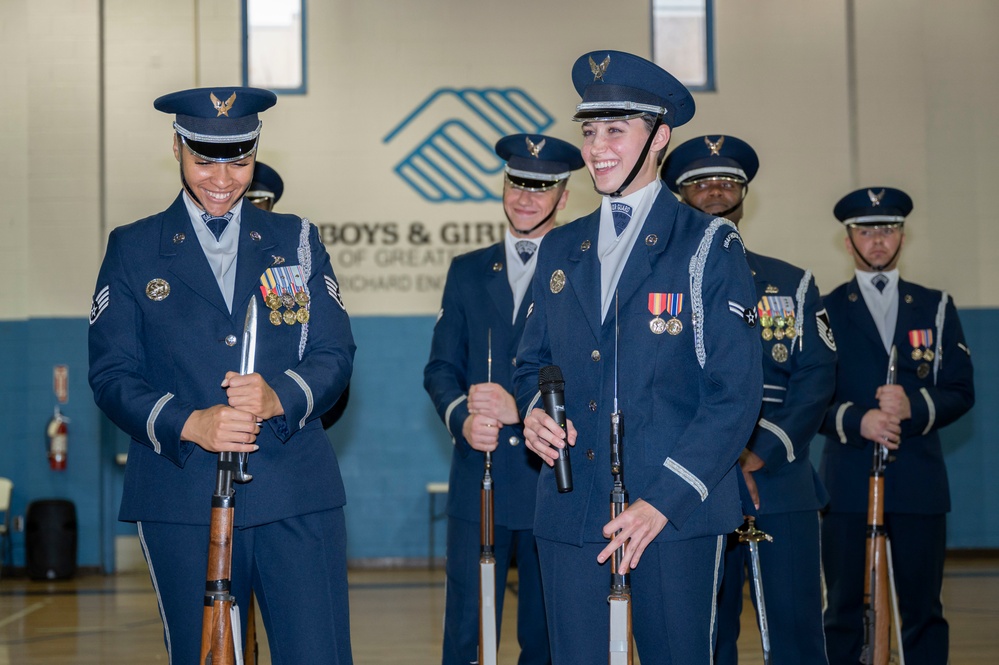 US Air Force Honor Guard Drill Team performs for local children