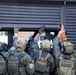 A Special Response Team (SRT) from Homeland Security Investigations (HSI) cuts  open a security door while serving a warrant as part of Operation Boiling Point
