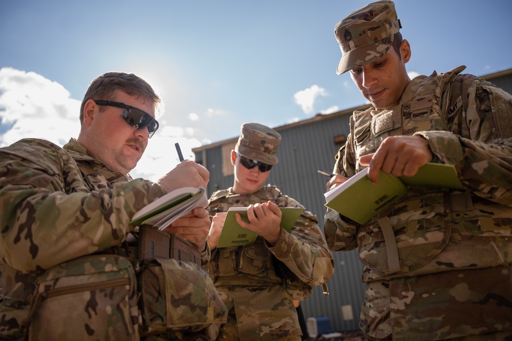 Soldiers Fill Out SALUTE Report During Soldier Touch Point