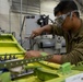 Maintenance Airmen repair APU doors