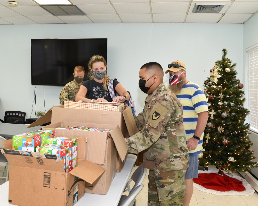 USAG Fort Buchanan Religious Support Office (RSO) staff and volunteers packed shoeboxes filled with toys delivered to the Christian Alliance and Missionary Church during the eve of Three Kings Day, January 5, 2022. According to this timeless tradition, al