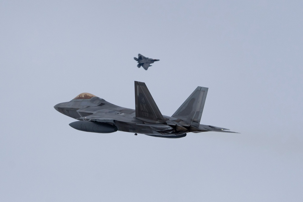 JBER F-22s project air dominance in two theaters