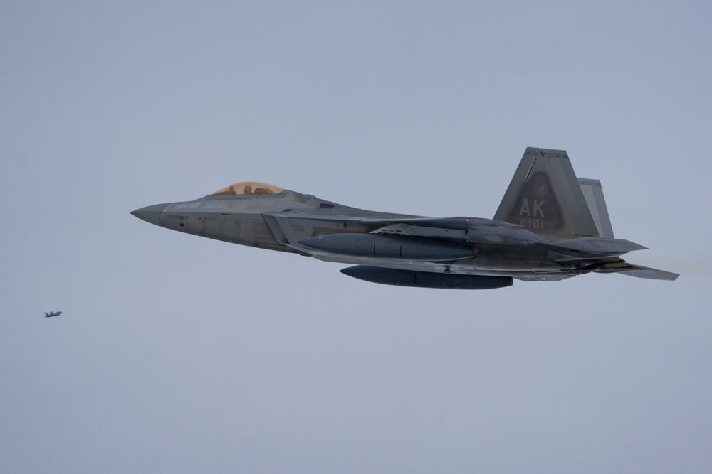 JBER F-22s project air dominance in two theaters