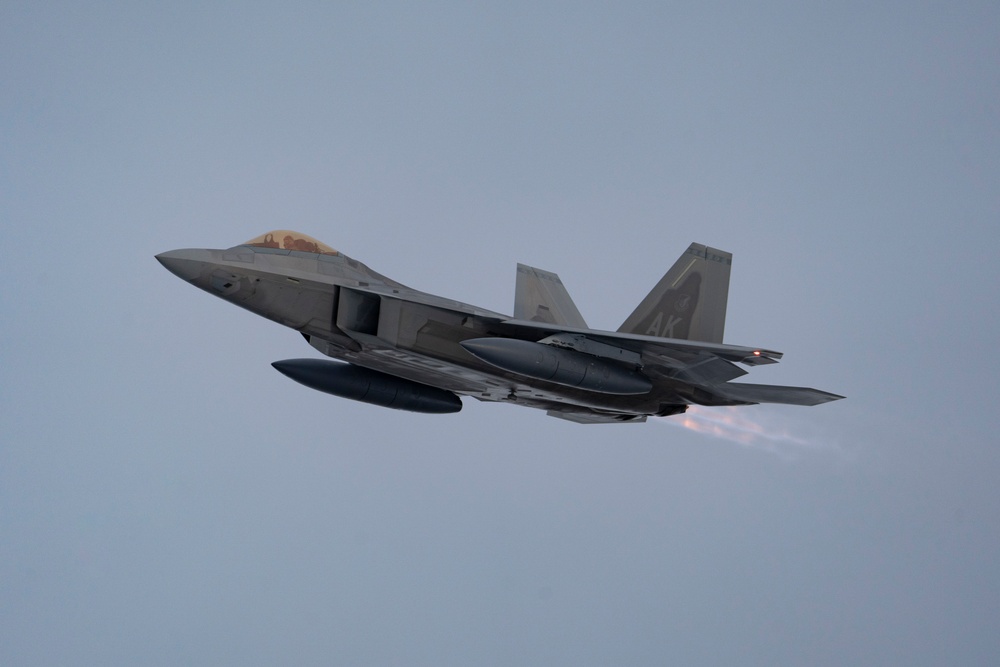 JBER F-22s project air dominance in two theaters