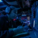 Sailors Stand Watch In Combat Information Center On Board USS Higgins