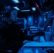 Sailors Stand Watch In Combat Information Center On Board USS Higgins