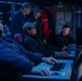 Sailors Stand Watch In Combat Information Center On Board USS Higgins