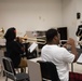 Members of the U.S Navy Band Commodores present clinic at Huston–Tillotson University.