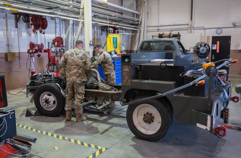 Photo of 116th Logistics Readiness Squadron Airmen working on Bobtail truck engine