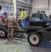 Photo of 116th Logistics Readiness Squadron Airmen working on Bobtail truck engine