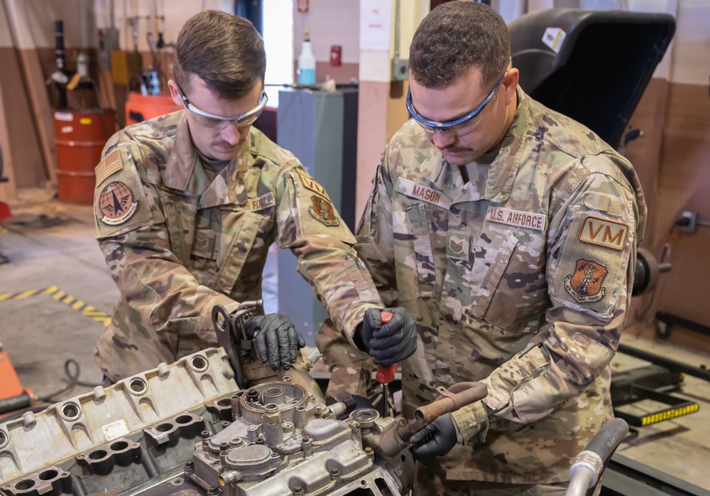 Photo of 116th Logistics Readiness Squadron Airmen working on Bobtail truck engine