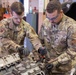 Photo of 116th Logistics Readiness Squadron Airmen working on Bobtail truck engine