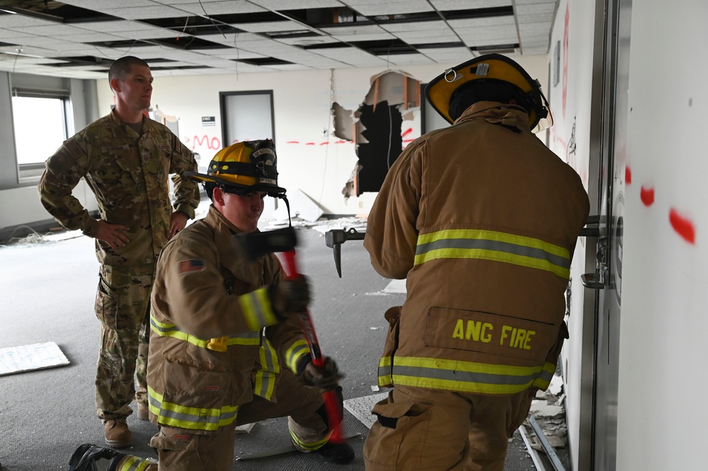 115th fire protection specialists train to breach walls and doors