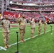 653rd RSG commander conducts reenlistment ceremony at NFL game