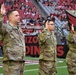 653rd RSG commander conducts reenlistment ceremony at NFL game