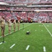 653rd RSG commander conducts reenlistment ceremony at NFL game