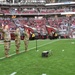 653rd RSG commander conducts reenlistment ceremony at NFL game