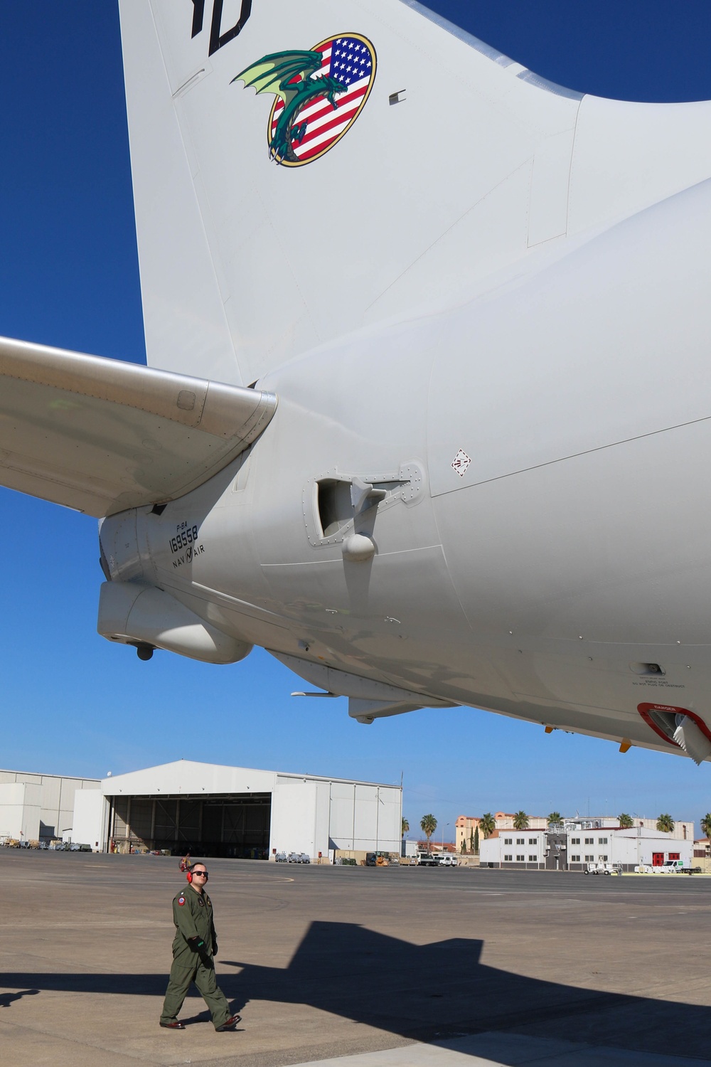 Commanding Officer of VP-4 Pre-flights a P8-A Poseidon