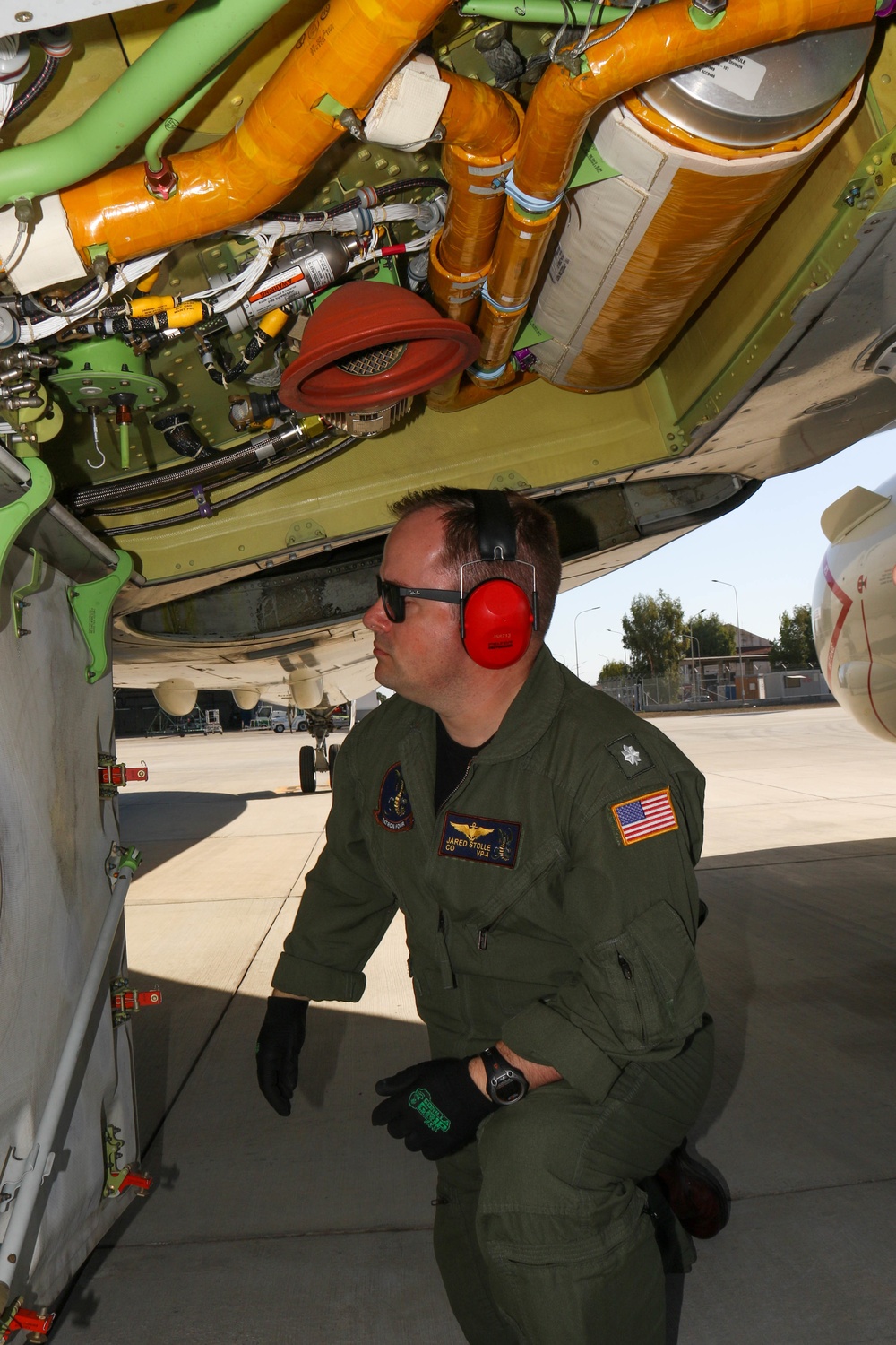 Commanding Officer of VP-4 Pre-flights a P8-A Poseidon