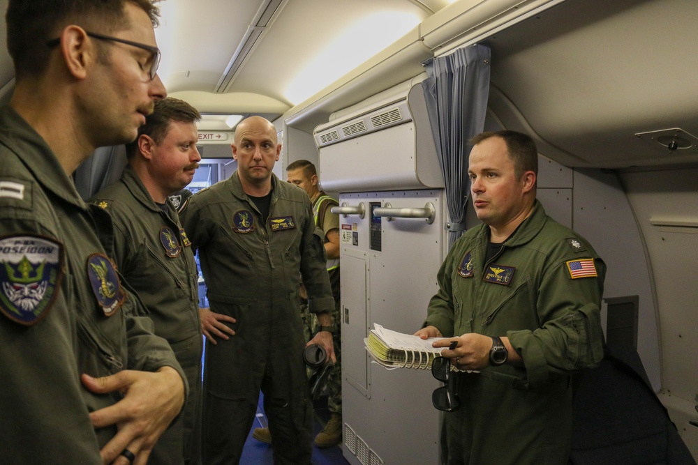 Commanding Officer of VP-4 Pre-flights a P8-A Poseidon