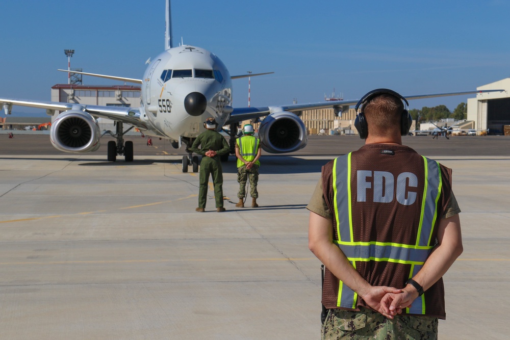 Commanding Officer of VP-4 Pre-flights a P8-A Poseidon