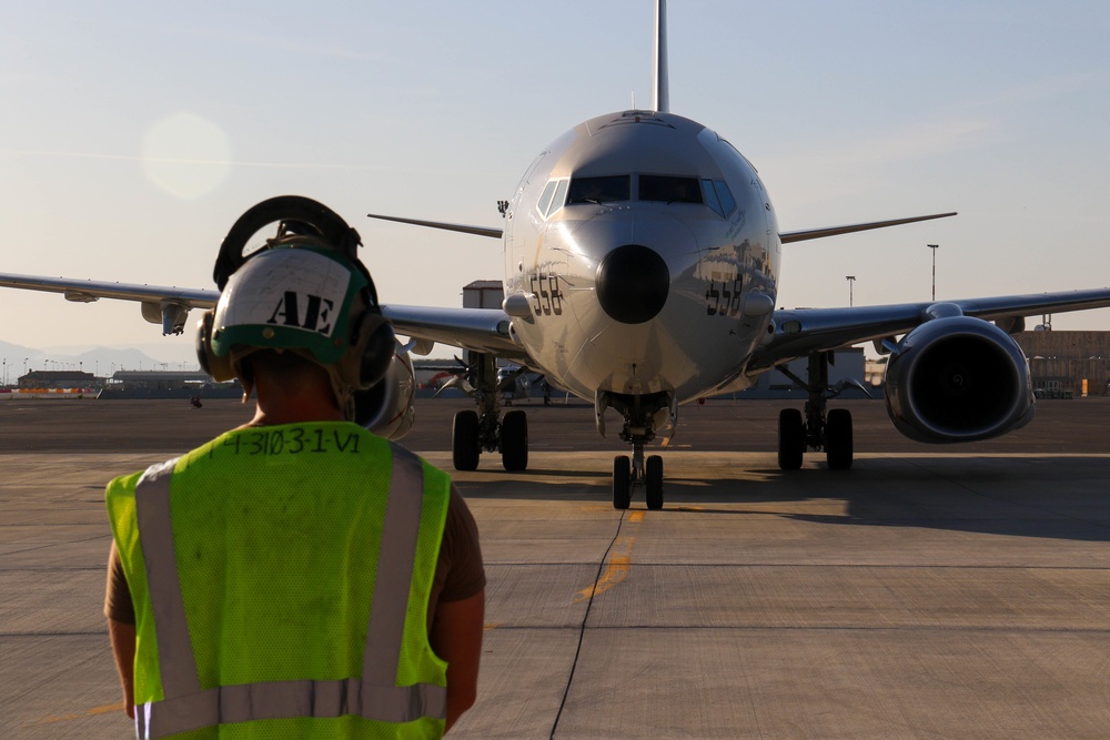 Commanding Officer of VP-4 Pre-flights a P8-A Poseidon