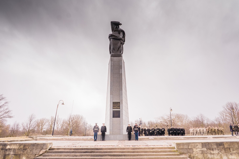 MSGs participate in a commemorative flower laying ceremony in Latvia