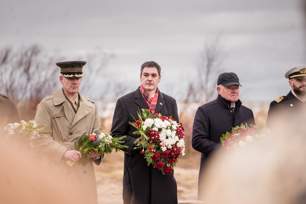 MSGs participate in a commemorative flower laying ceremony in Latvia