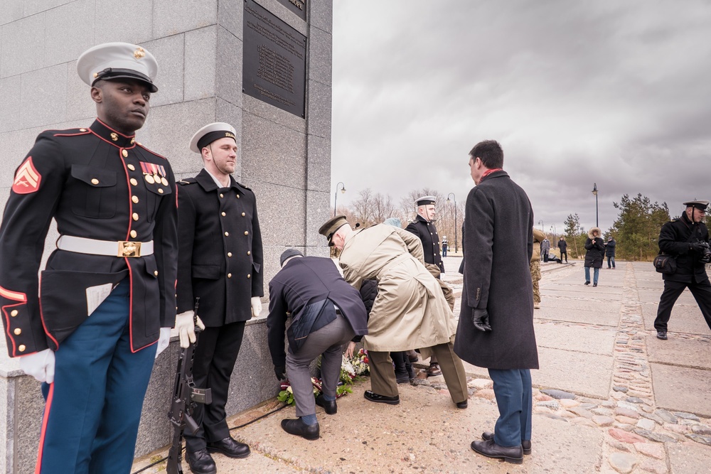 MSGs participate in a commemorative flower laying ceremony in Latvia