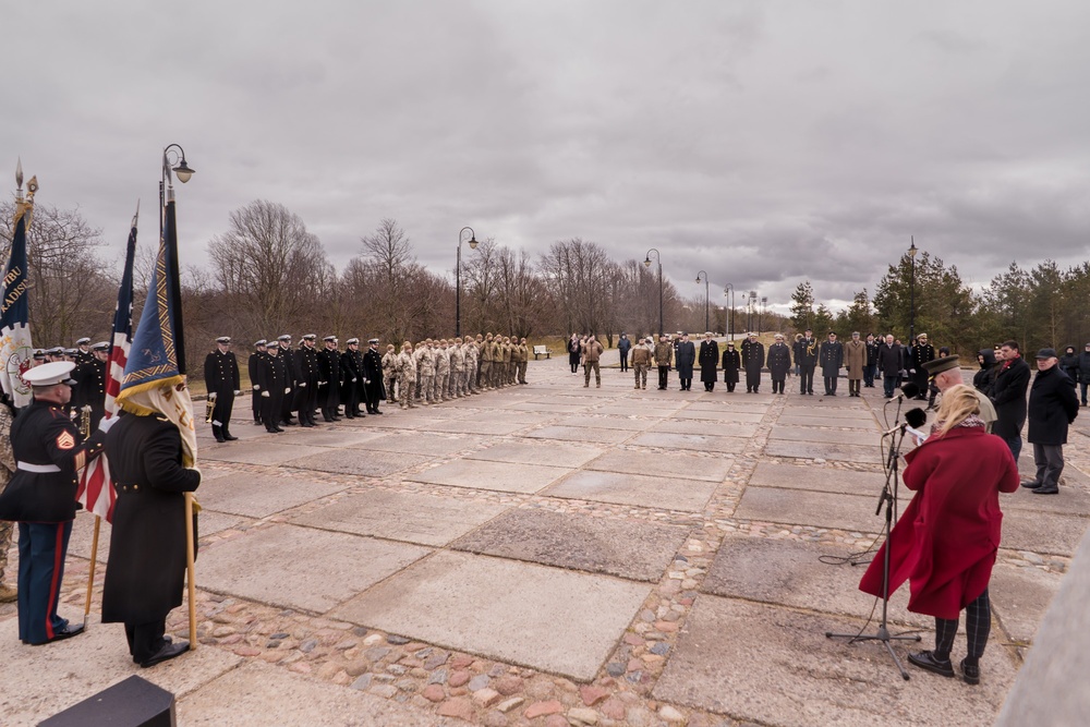MSGs participate in a commemorative flower laying ceremony in Latvia