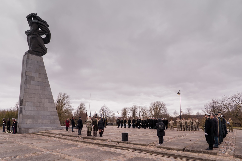 MSGs participate in a commemorative flower laying ceremony in Latvia