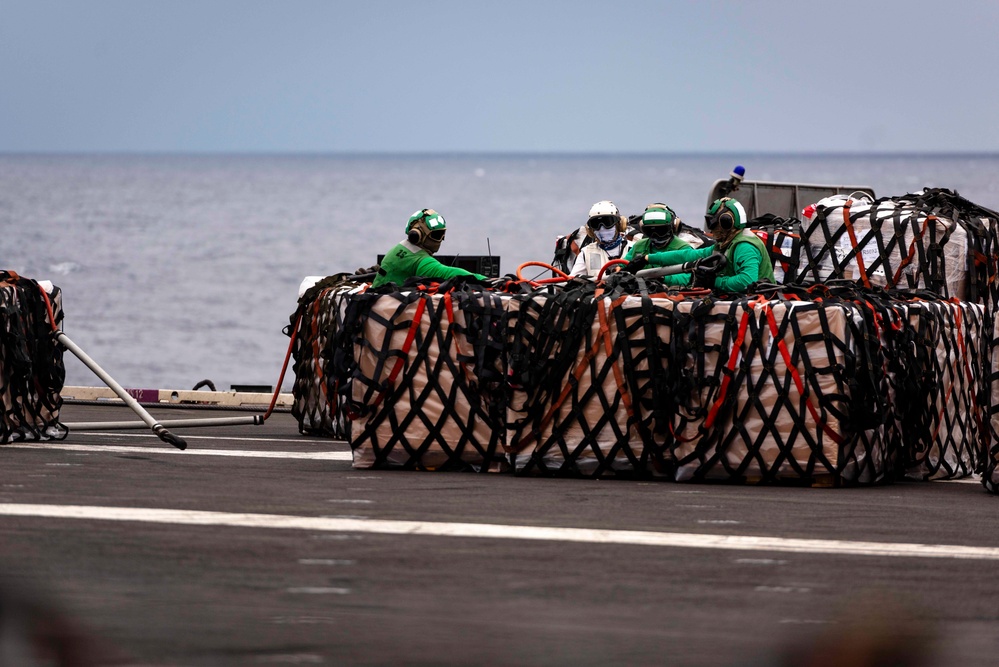 USS Ronald Reagan (CVN 76) conducts replenishment-at-sea with USNS Carl Brashear