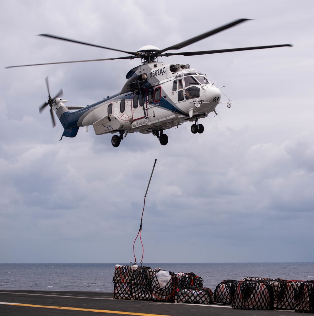 USS Ronald Reagan (CVN 76) conducts replenishment-at-sea with USNS Carl Brashear