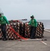 USS Ronald Reagan (CVN 76) conducts replenishment-at-sea with USNS Carl Brashear