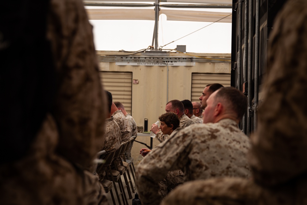 U.S. Marines critique each other during peer evaluated presentation