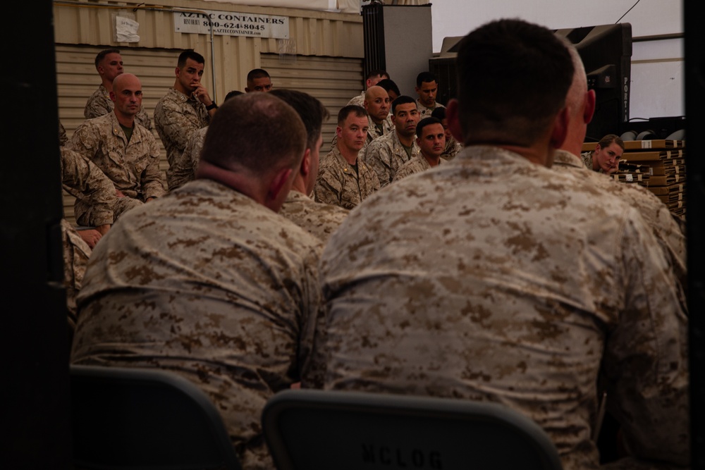 U.S. Marines critique each other during peer evaluated presentation