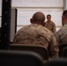 U.S. Marines critique each other during peer evaluated presentation
