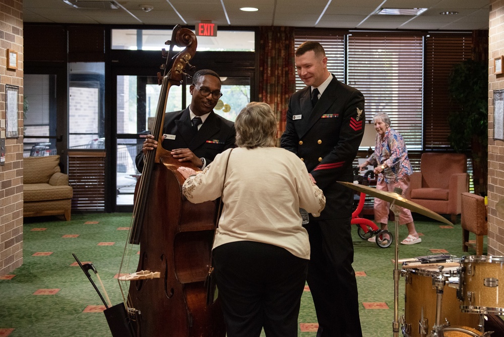 The U.S. Navy Commodores perform at Morningside at the Meadows senior living community.